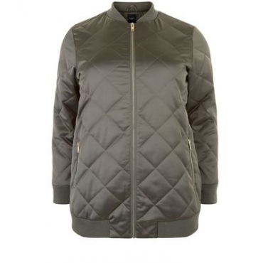 Curves – Lange, gesteppte Bomberjacke in Khaki 