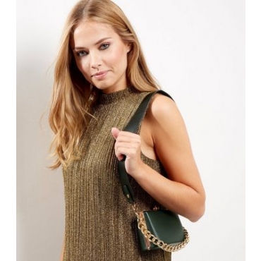 Dunkelgrüne, kleine Koffertasche mit Kettenverzierung 